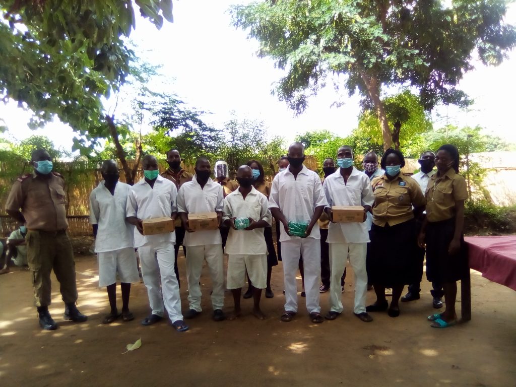 Scout members pose with Karonga Prison inmates